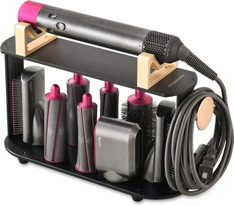 Dyson airwrap with display stand and extra barrel - This version of the Dyson Airwrap has longer attachments (with a 1.2-inch barrel and a 1.6-inch barrel), making it more effective when it comes to styling long hair. TL;DR: You can get an easier ...